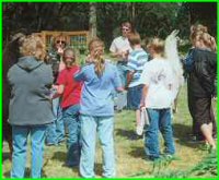 Cathy teaching a youth class llama behavior and training